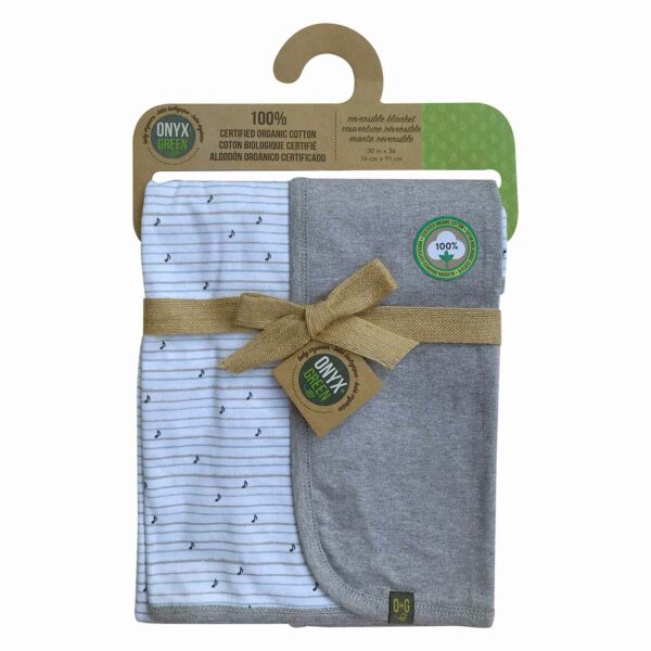 Certified Organic Reversible Baby Blanket in packaging (Music Notes)